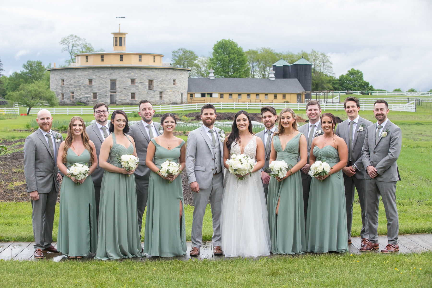 A group photo of the wedding party at Hancock Shaker Village.