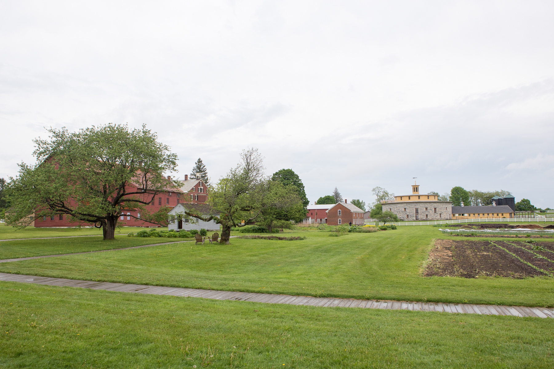 The historic and rustic setting of Hancock Shaker Village as the backdrop for the wedding.