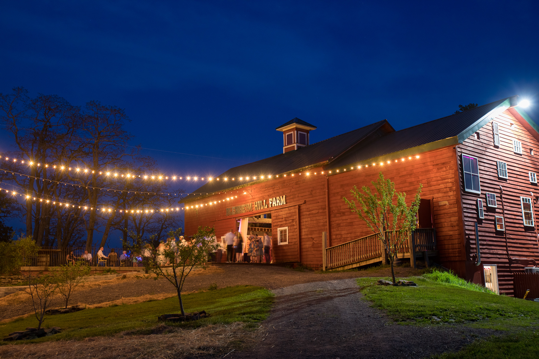 A night time view of the renovated barn at Blenheim Hill Farm