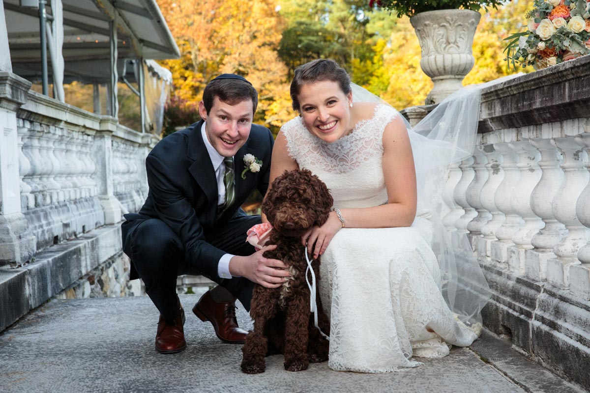 a bride and groom with their dog at the Mount, Edith Whartons Estate in the Berkshires