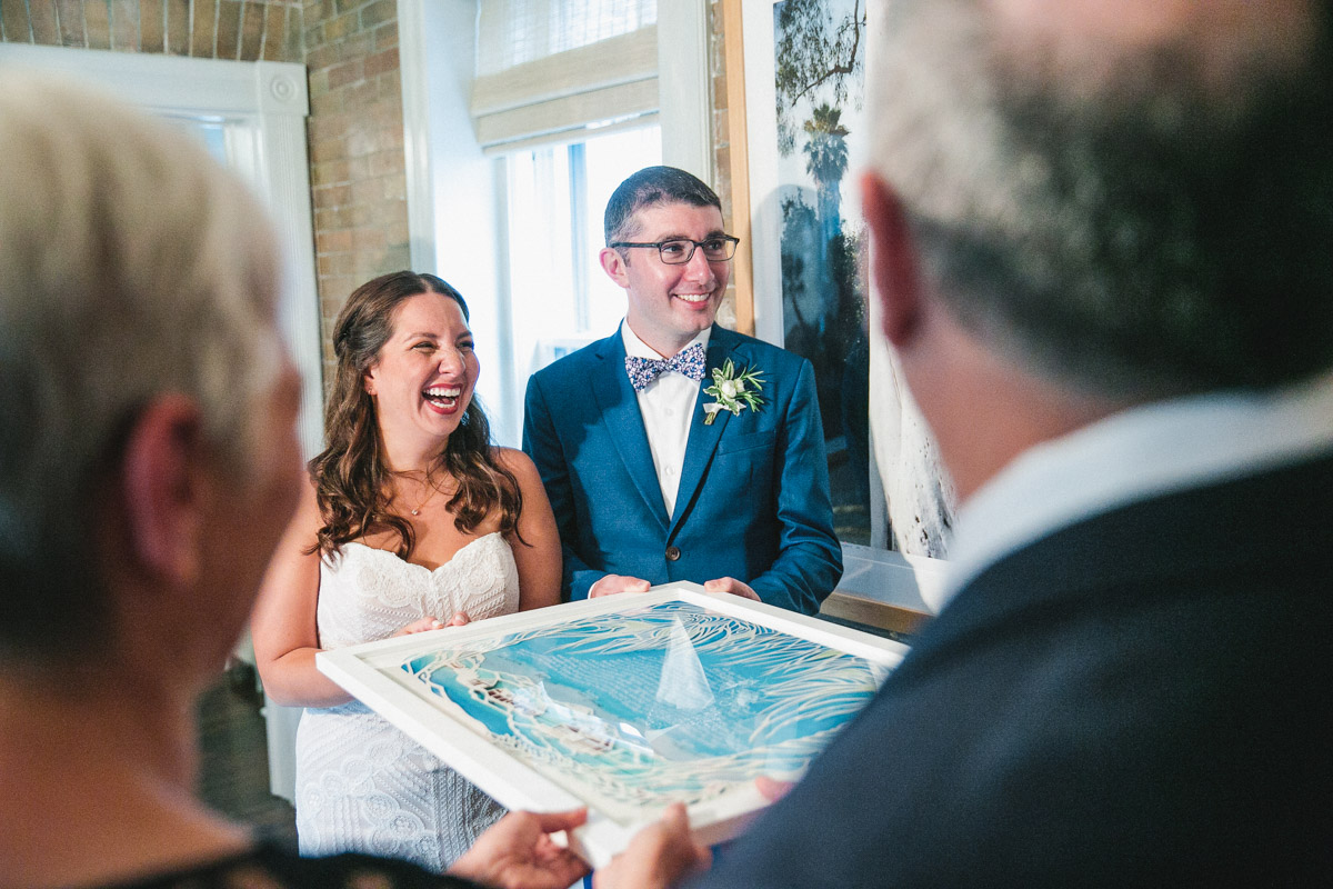 happy couple share a moment with their families at Stonover Farm