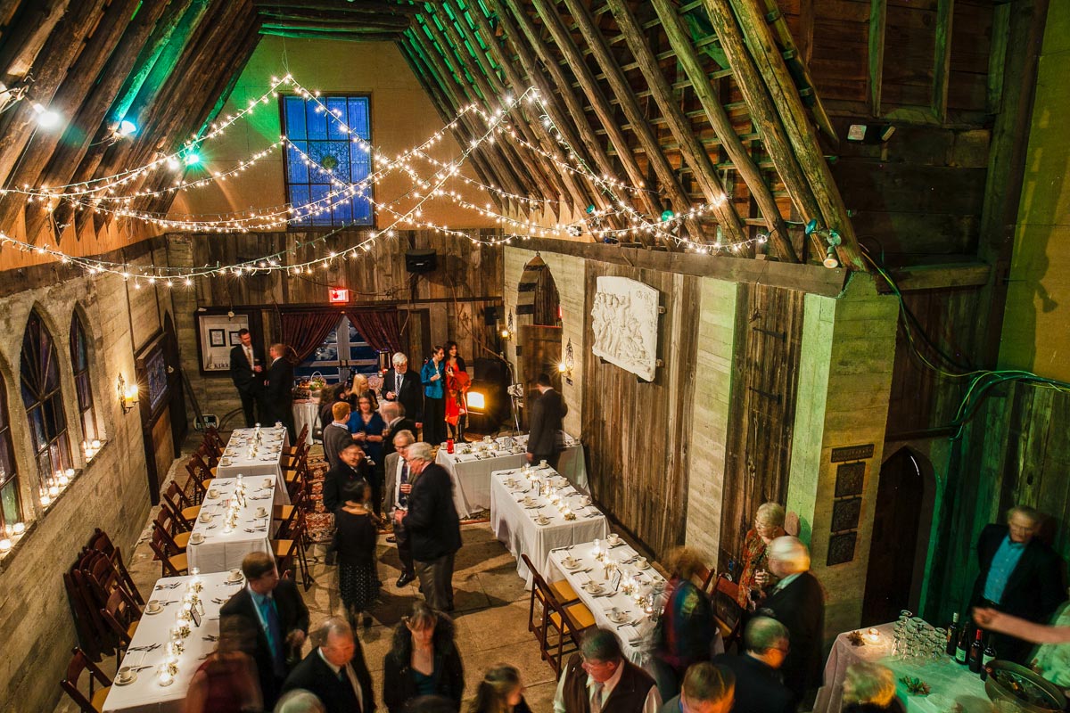 Guests mingling and enjoying drinks at the Santarella wedding reception.