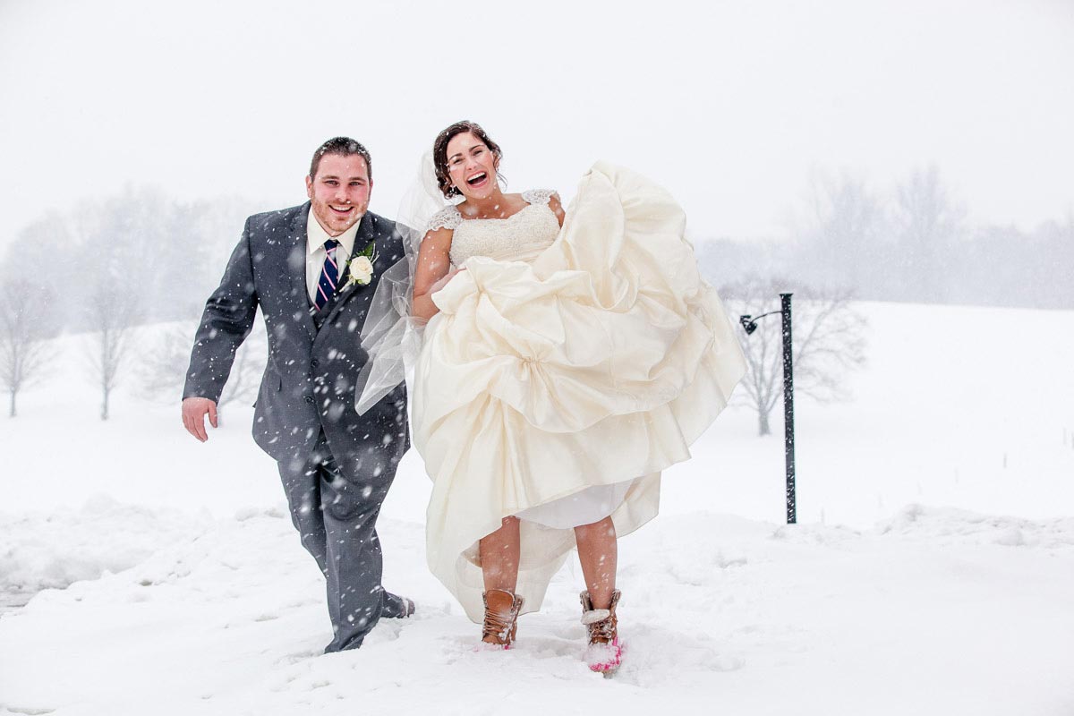 Bride and groom in the snow at the Barn at Gibbet Hill