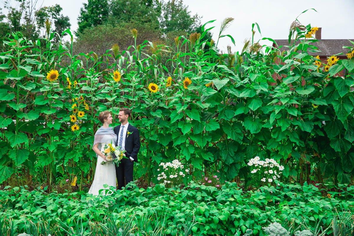 bride and groom in the gardens at Hancock Shaker Village