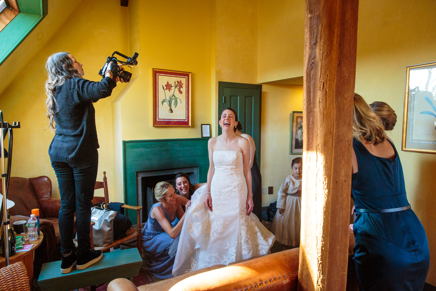 bride getting ready in the bridal suite at Gedney Farm