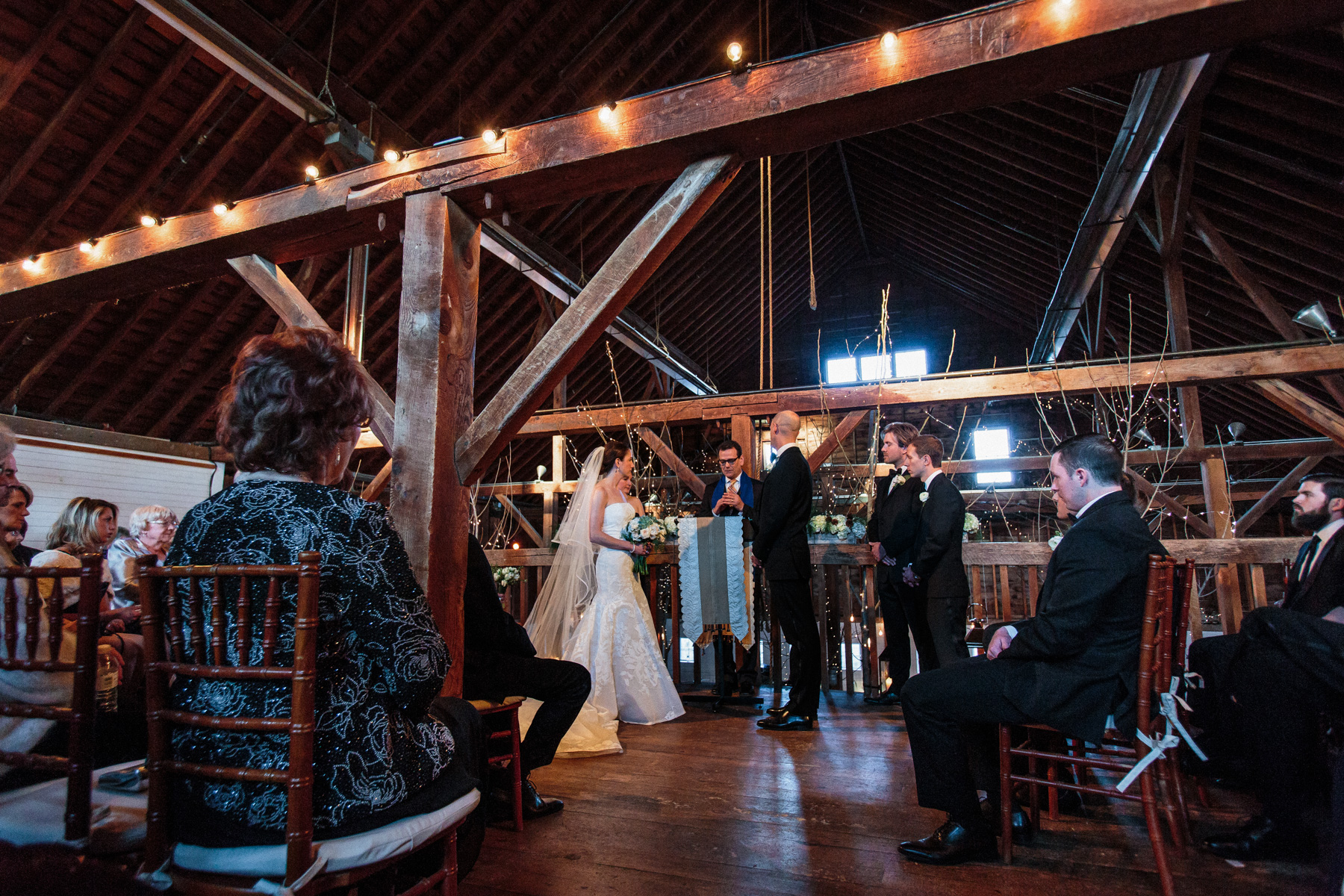 wedding ceremony in the loft at Gedney Farm