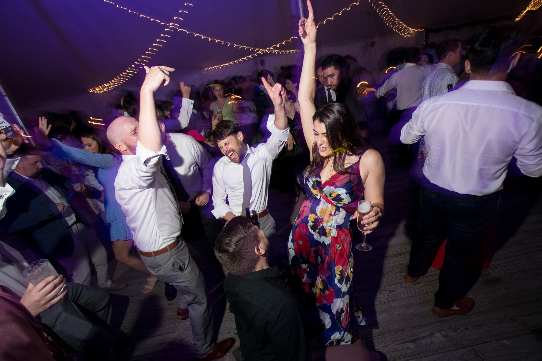 Guests having a great time on the dance floor at the reception.