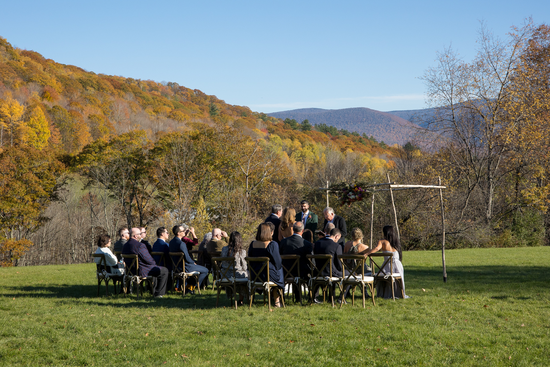 wedding ceremony at the Brookman Estate with Mt. greylock in the background