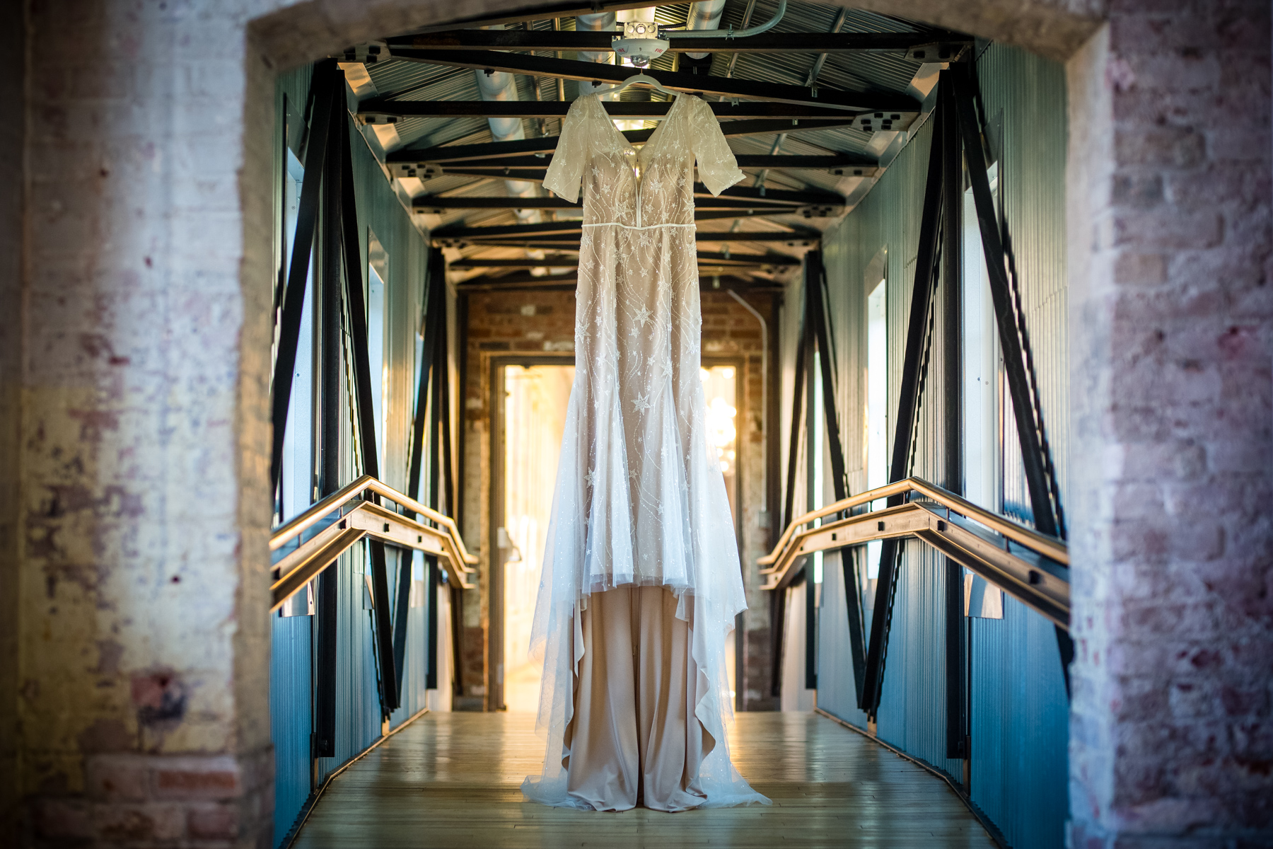 wedding dress hanging up at mass moca