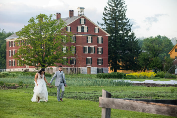 couple walking the grounds at Hancock Shaker Village