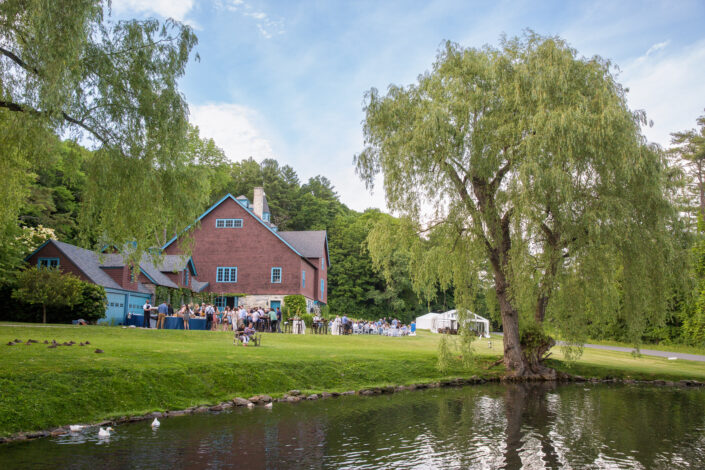 Manicured lawn by the duck pond at Stonover Farm, set for a champagne reception