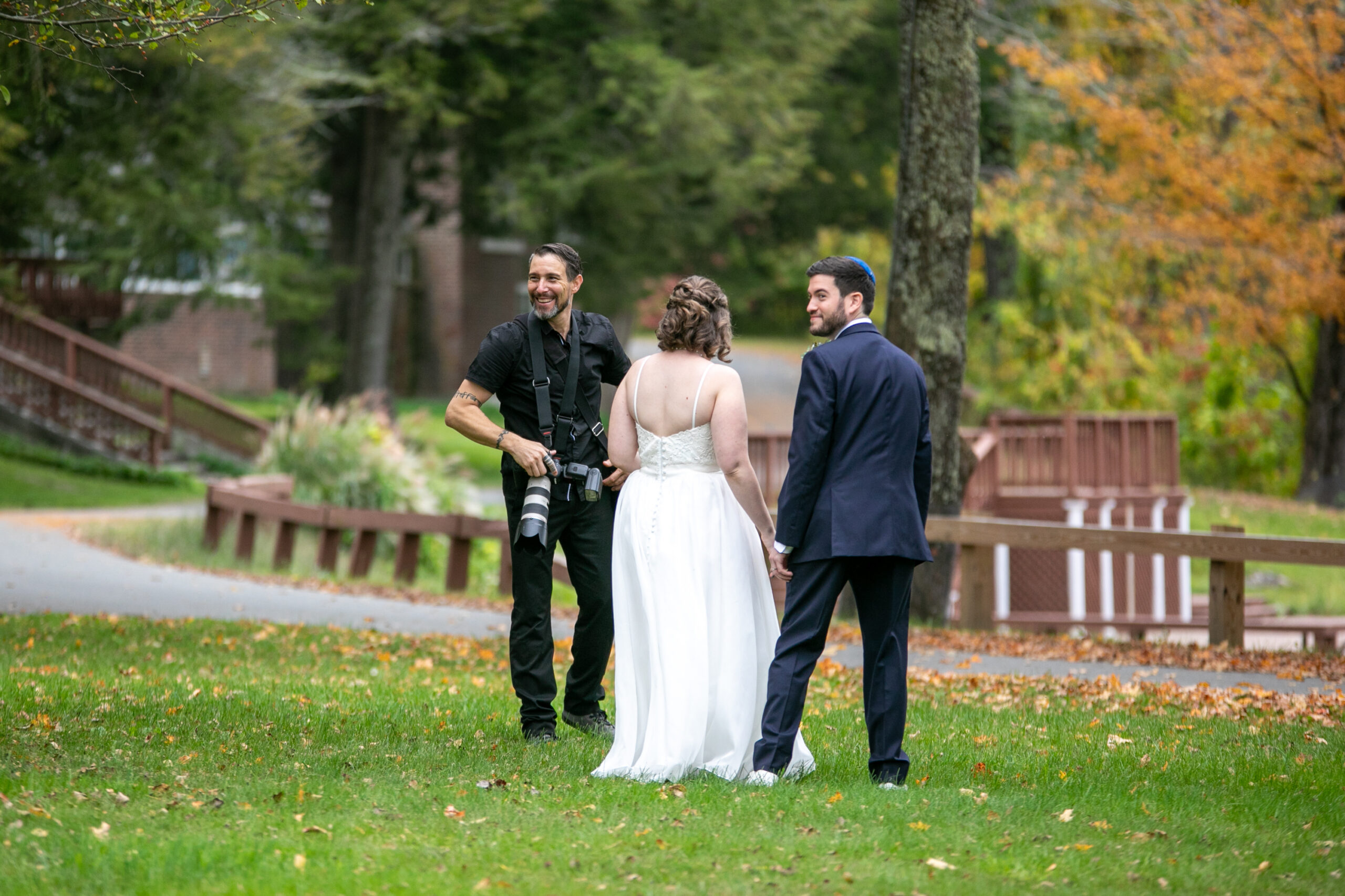 eric limon with bride and groom